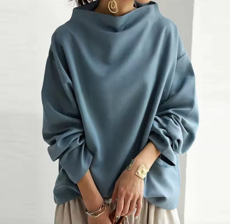 Women’s Lumina Wear Rachel high-neck top with long sleeves, elegant design, and fitted silhouette.