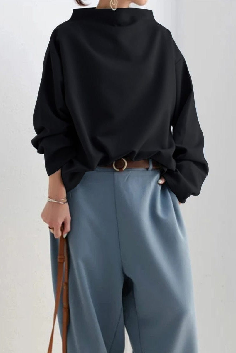 Elegant Lumina Wear Rachel high-neck women's top with long sleeves, showcasing a fitted silhouette and soft fabric.