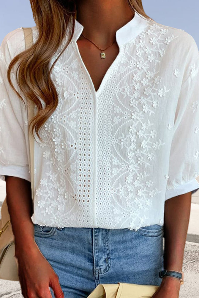 Lumina Wear Serena women's blouse featuring elegant puff sleeves and a V-neckline, stylish and suitable for casual or dressy occasions.