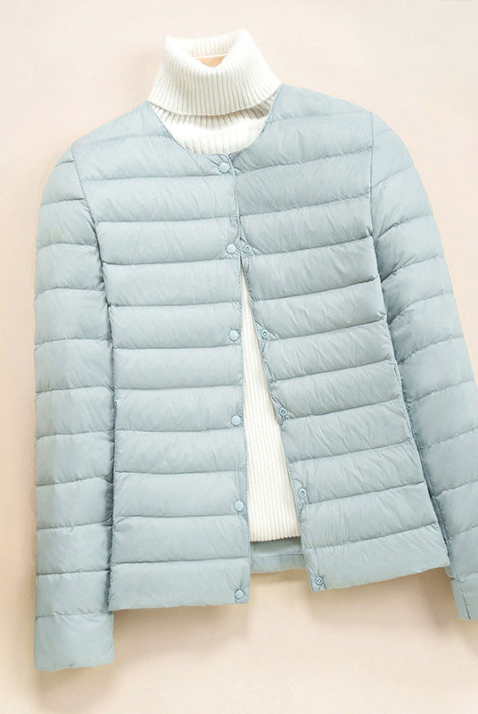 Lumina Wear Serena lightweight quilted puffer jacket with snap button closure, stylish down jacket for cold weather.