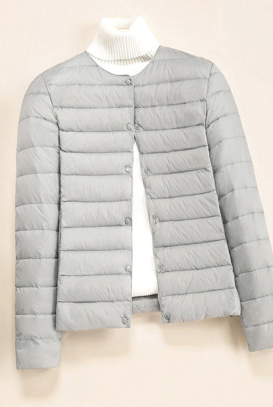 Lumina Wear Serena lightweight quilted puffer jacket with snap button closure, stylish down jacket for cold weather.