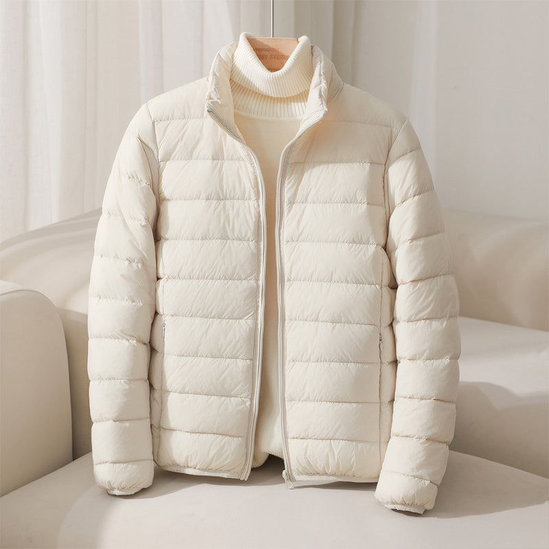 Lumina Wear Silva pastel lightweight insulated jacket with a high collar, perfect for cold weather and stylish outdoor wear.