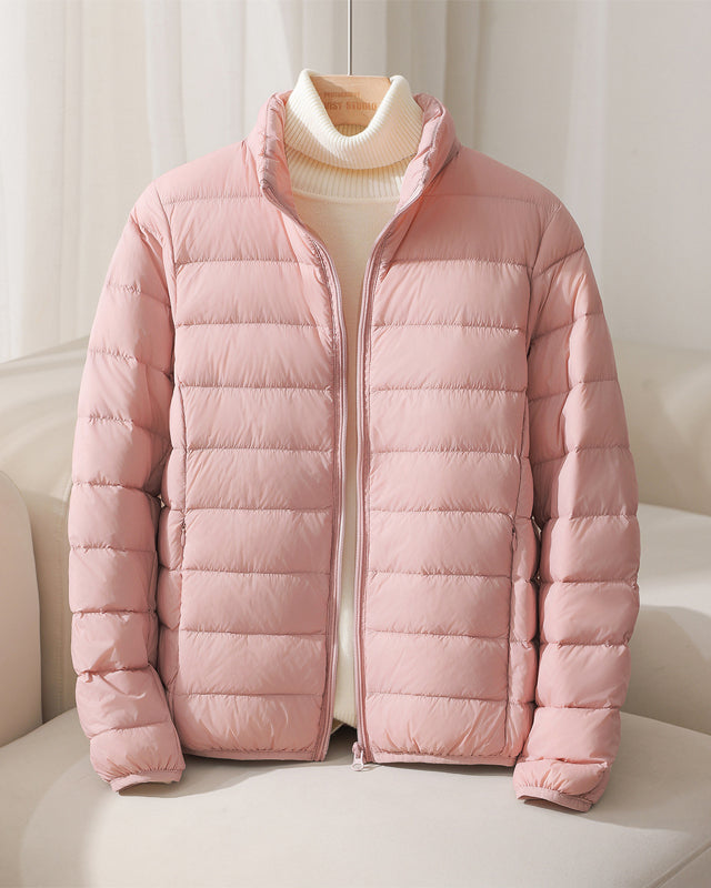 Lumina Wear Silva pastel lightweight insulated jacket with high collar, ideal for cold weather, shown in soft pastel color.