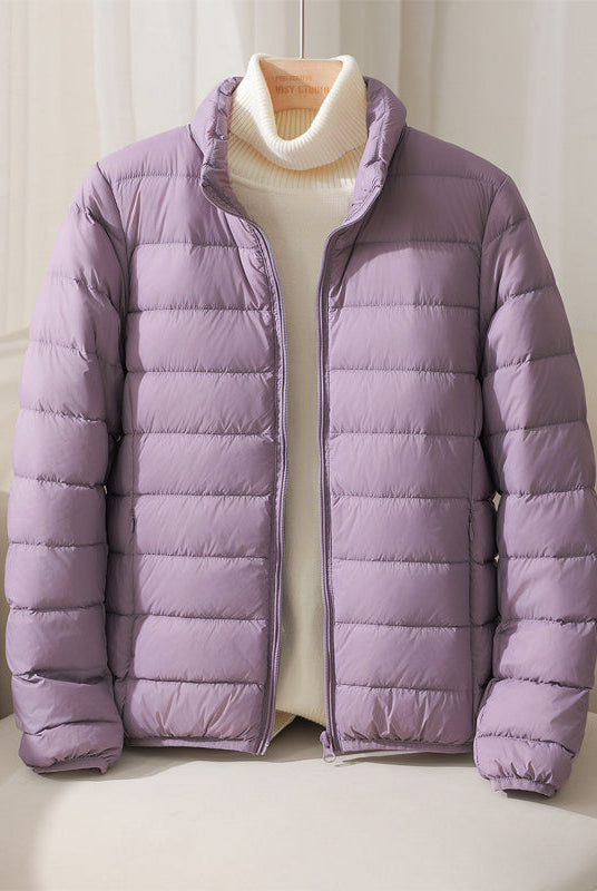 Lumina Wear Silva pastel lightweight insulated high collar jacket with a cozy design, perfect for cold weather.