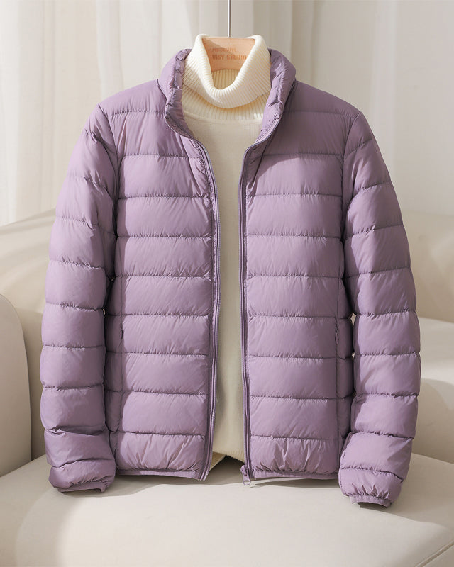 Lumina Wear Silva pastel lightweight insulated high collar jacket, stylish and warm for outdoor wear, shown in a soft pastel color.