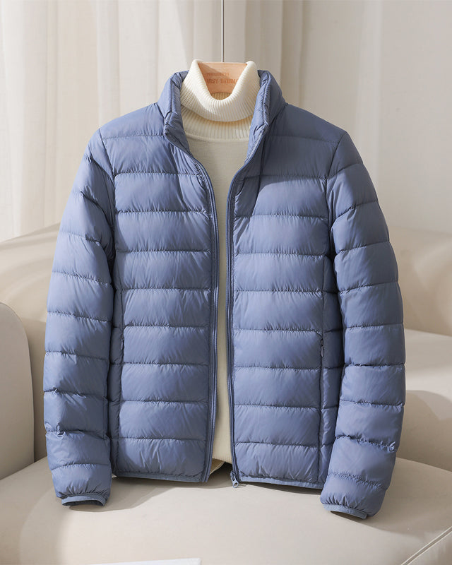Silva Lumina Wear pastel lightweight insulated jacket with high collar, ideal for cold weather and casual outdoor wear.