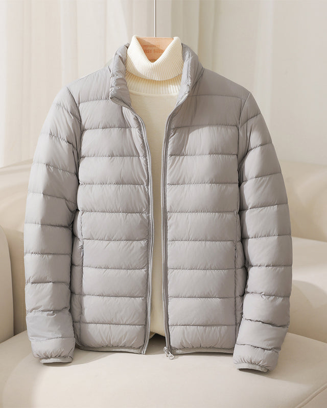 Lumina Wear Silva pastel lightweight insulated jacket with high collar, designed for comfort and warmth in outdoor activities.
