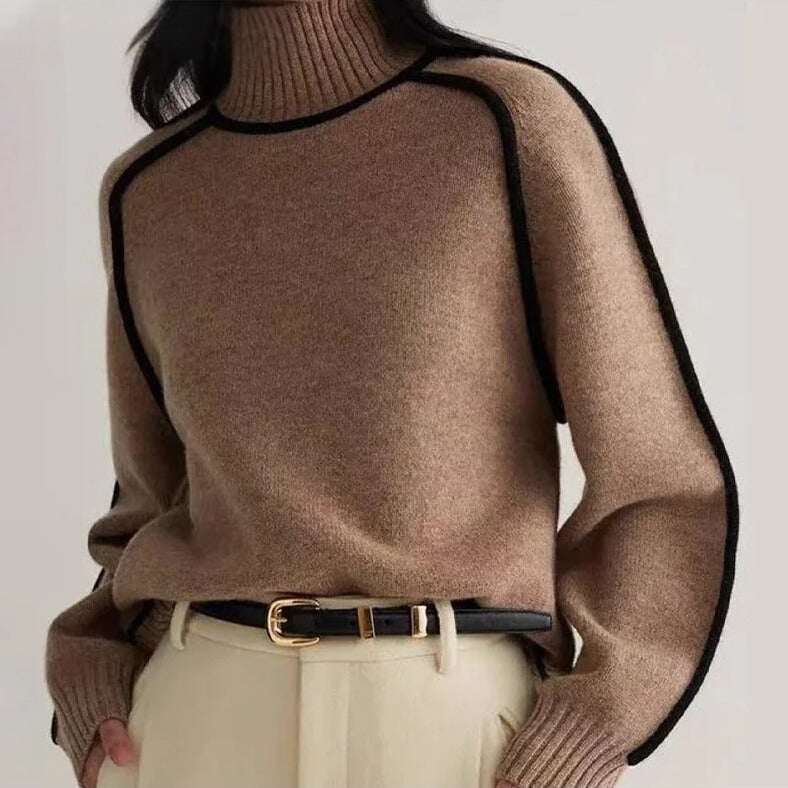 Lumina Wear Sloane minimalist high neck ribbed sweater with elegant piping, showcasing a fitted design and soft knit fabric.