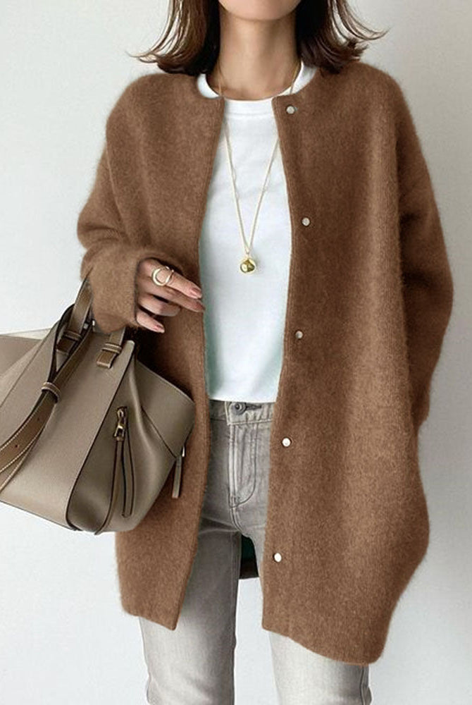 Sofia Amoretti relaxed fit wool cardigan with suede accents from Lumina Wear, shown styled with rolled sleeves and a cozy fit.