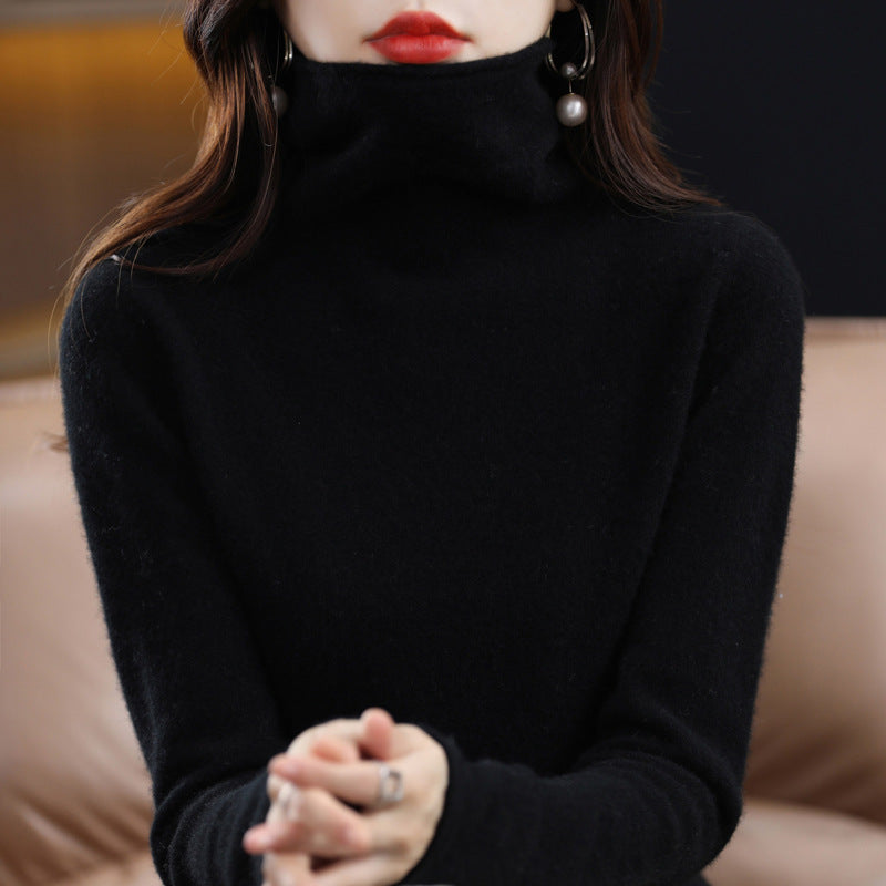 Lumina Wear Sofia cozy loose-fit sweater with a stacked collar, worn by a woman, showcasing its stylish and comfortable design.