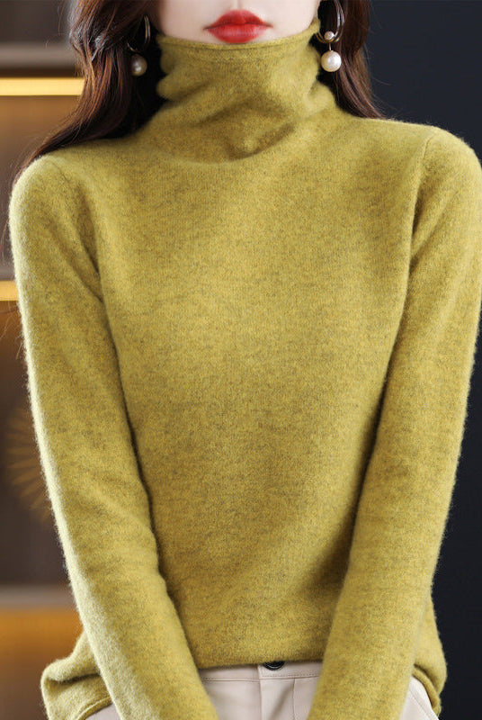 Lumina Wear Sofia cozy loose-fit sweater with stacked collar, worn by a woman, showcasing its soft fabric and stylish design.