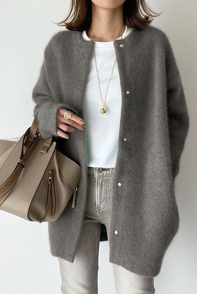 Lumina Wear Sofia cozy relaxed fit wool cardigan with suede accents, shown in a natural light, styled with a casual outfit.