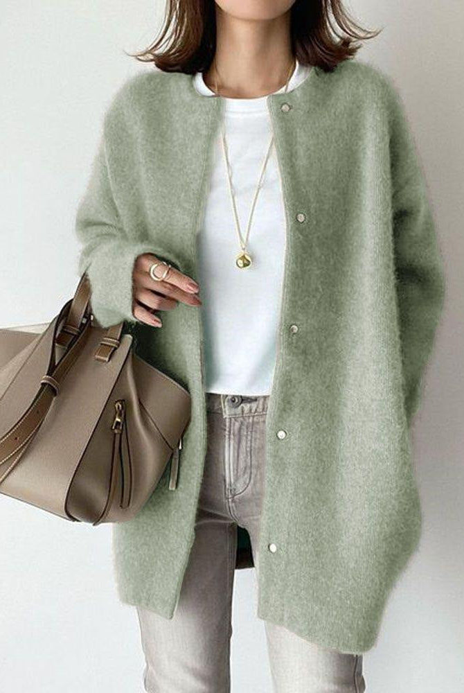 Sofia cozy relaxed fit wool cardigan with suede accents by Lumina Wear, shown in soft knit fabric with button closure and front pockets.