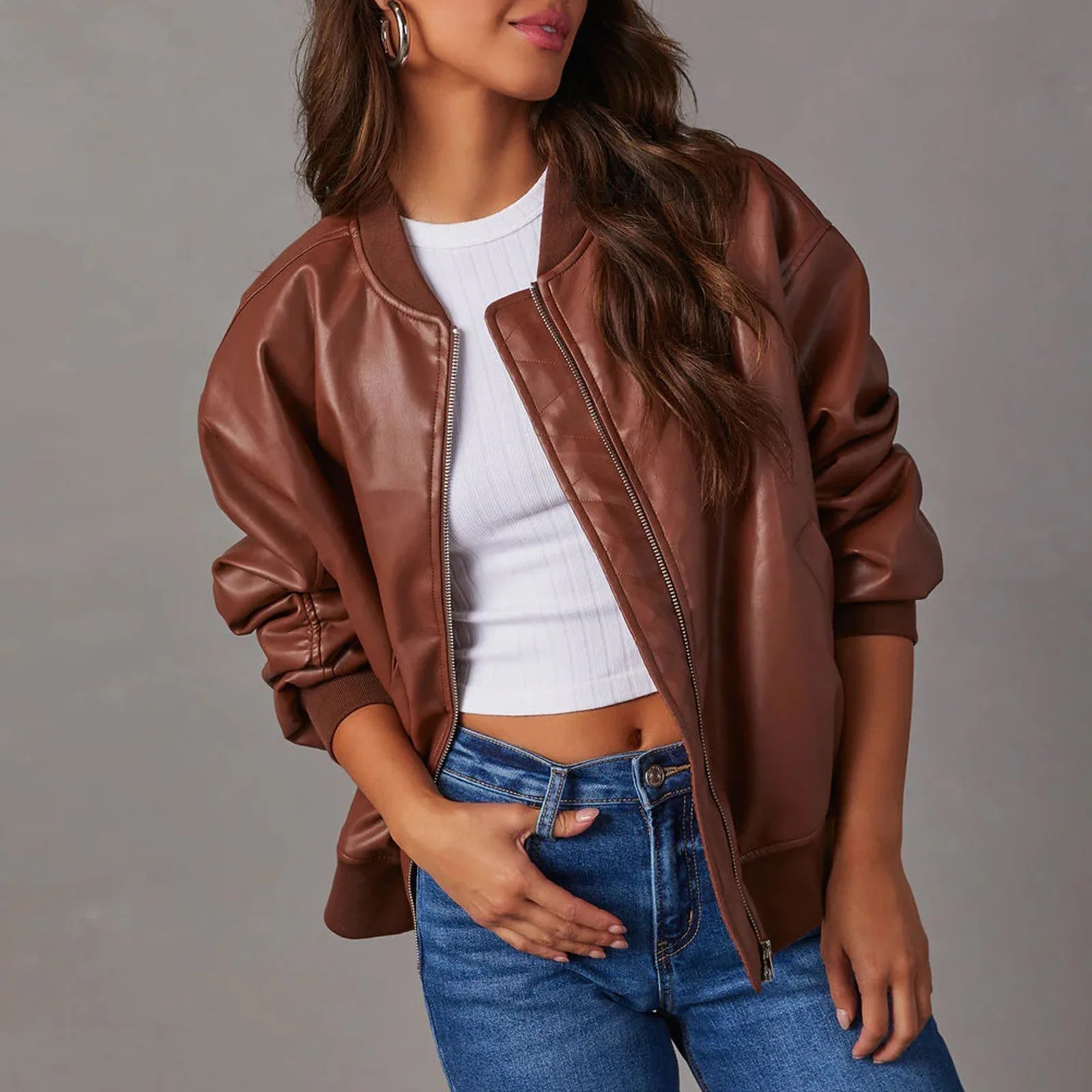 Sofia edgy faux leather jacket by Lumina Wear featuring a sleek band collar and stylish design, displayed on a hanger.
