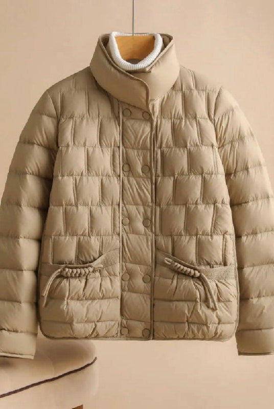 Elegant Lumina Wear Sofia insulated women's jacket in broadcloth with double-breasted design, perfect for cold weather.