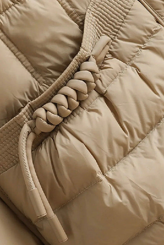 Elegant Lumina Wear Sofia double-breasted insulated women's jacket in broadcloth, showcasing its stylish design and warm insulation.