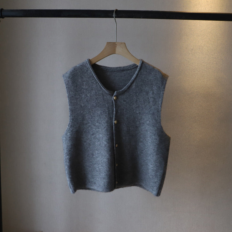 Elegant knitted women's vest by Lumina Wear, featuring a stylish layered design in soft, cozy fabric.