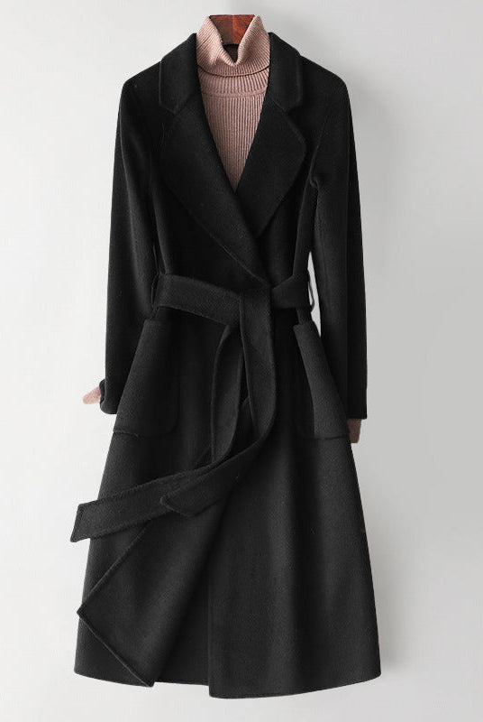 Elegant monochrome wool coat with waist belt for women, by Lumina Wear, featuring a tailored fit and classic style.