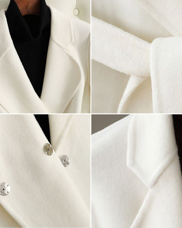 Elegant monochrome wool coat with waist belt by Lumina Wear, featuring a tailored fit and classic design.