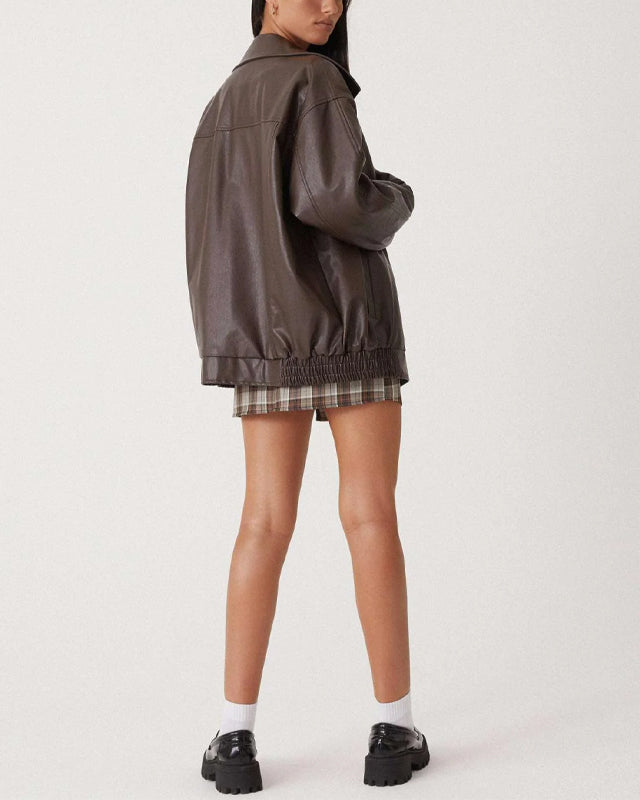 Lumina Wear Sofia oversized faux leather bomber jacket with relaxed fit, shown on a model, stylish and modern outerwear.