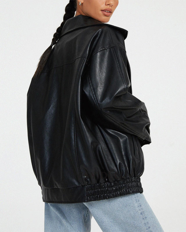 Lumina Wear Sofia oversized faux leather bomber jacket with relaxed fit, shown on a model with a casual streetwear style.