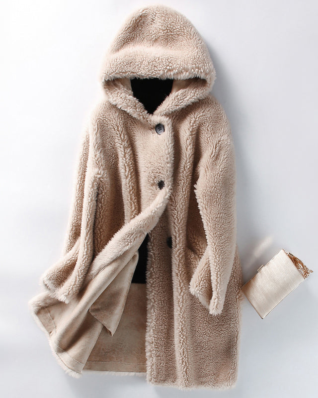 Luxurious plush oversized teddy coat with hood and large buttons by Lumina Wear, featuring a cozy, soft fabric and stylish design.