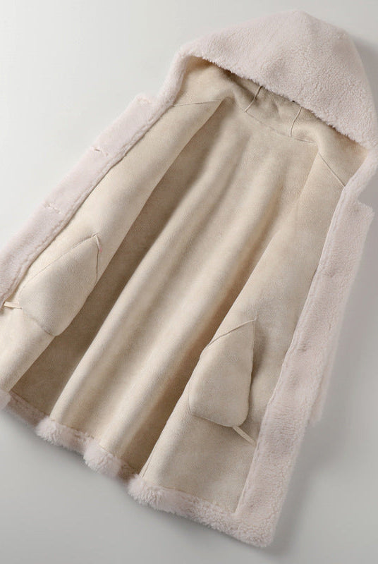 Lumina Wear Sofia plush oversized teddy coat with hood and large buttons, cozy women's winter coat in soft fabric.
