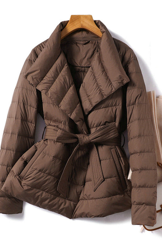 Lumina Wear Sofia quilted structured down jacket with tie belt, featuring a sleek design and warm insulation.