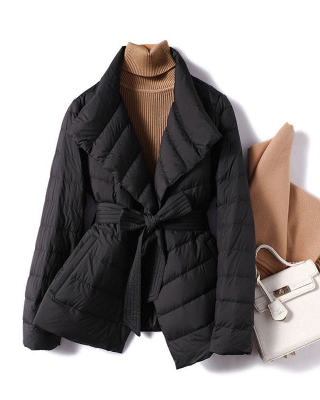 Lumina Wear Sofia quilted structured down jacket with tie belt, featuring a sleek design and cozy insulation.
