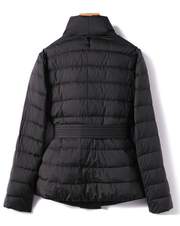 Lumina Wear Sofia quilted structured down jacket with tie belt, featuring a sleek design and insulated warmth.