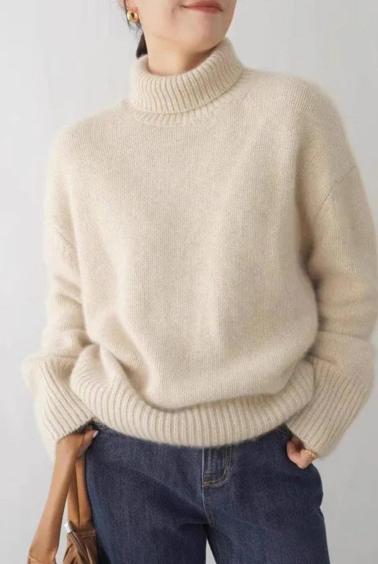 Light gray Lumina Wear Sofia relaxed ribbed turtleneck sweater with dropped shoulders, soft knit fabric, and cozy fit.