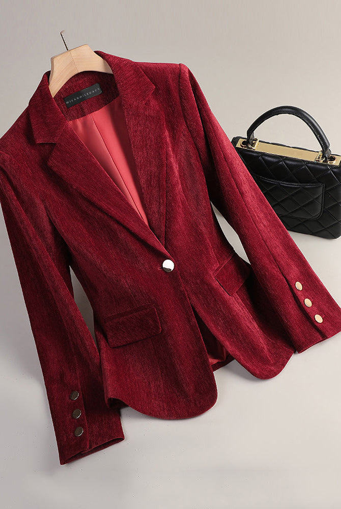 Slim tailored velvet blazer with radiant texture from Lumina Wear, shown in deep jewel tone fabric.