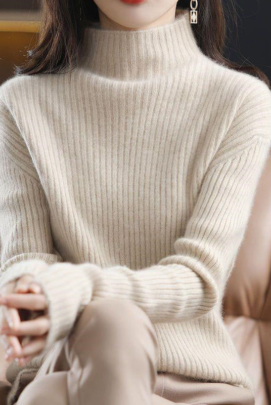 Sofia Lumina Wear striped oversized turtleneck sweater featuring bold horizontal stripes and a cozy fit for casual comfort.