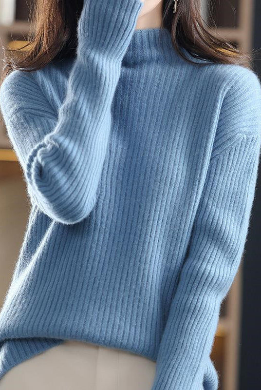 Sofia striped oversized turtleneck sweater by Lumina Wear, featuring bold horizontal stripes and a cozy, relaxed fit.