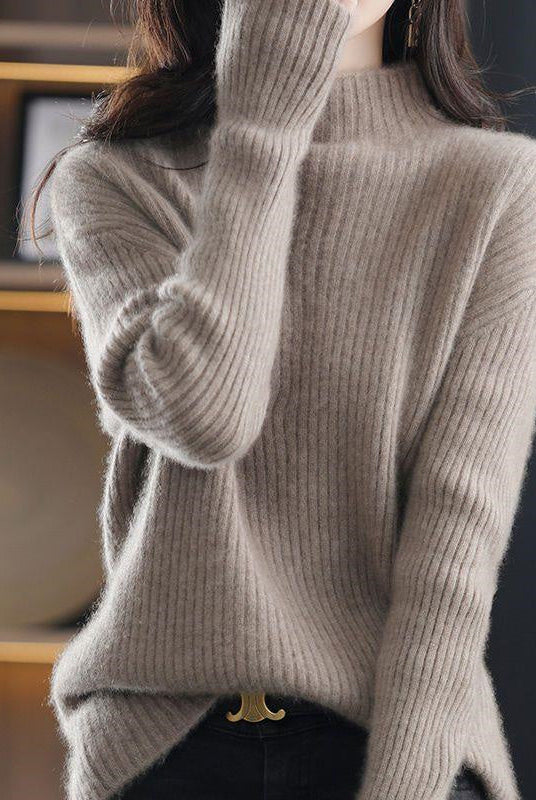 Oversized striped turtleneck sweater from Lumina Wear featuring a cozy, casual fit in soft fabric with bold stripe pattern.