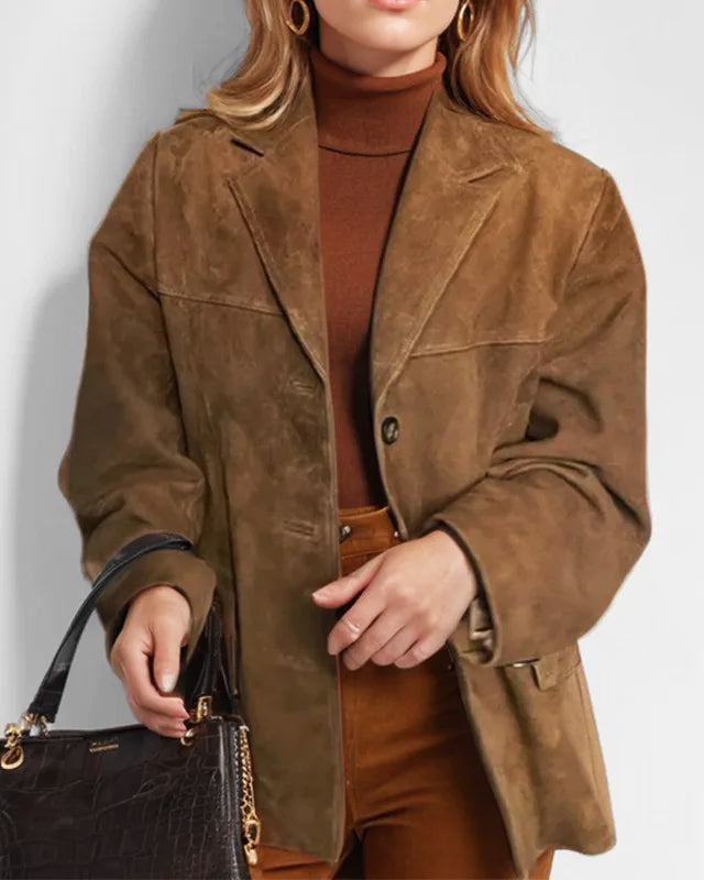 Sophia Lumina Wear tailored structured suede jacket with practical pockets, featuring a sleek design and elegant fit.