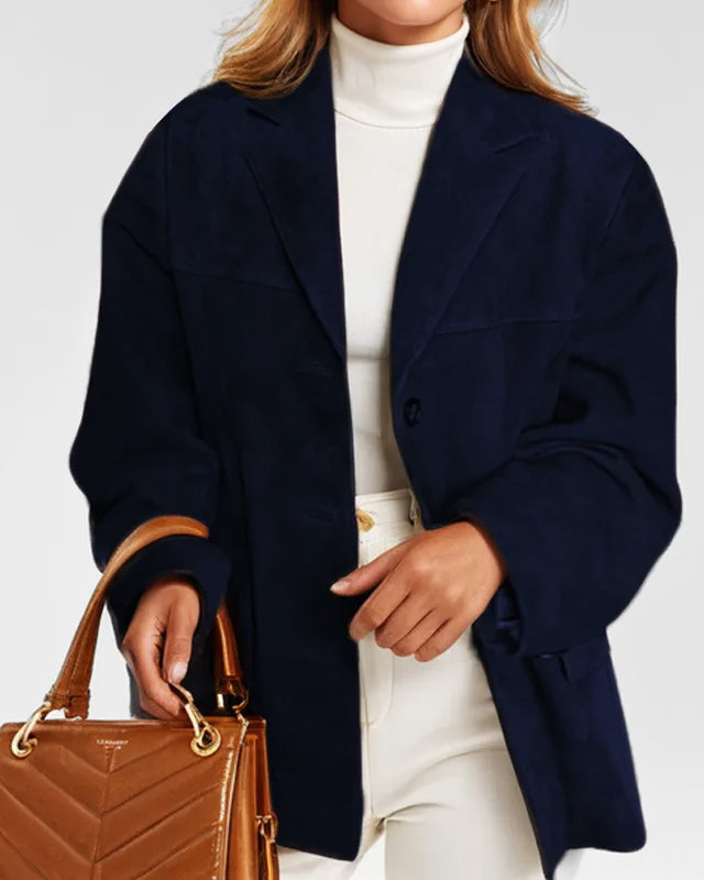 Lumina Wear Sofia tailored structured suede jacket with practical pockets, showcasing a stylish fit and soft suede material.