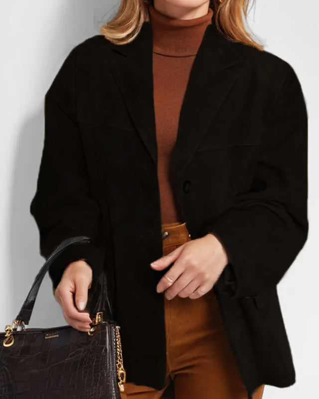 Lumina Wear Sofia tailored structured suede jacket with practical pockets, showcasing a stylish and fitted design with detailed stitching.