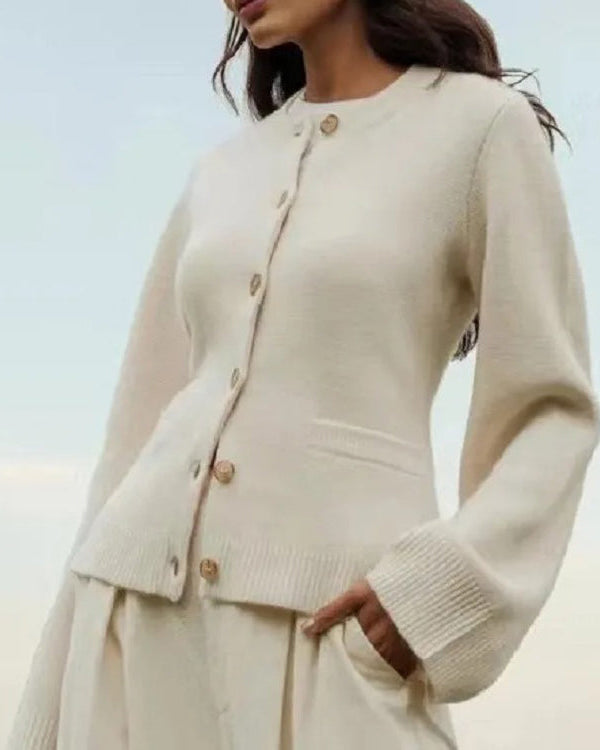 Elegant vintage-inspired Lumina Wear Sofia cardigan with button front and side pockets, showcased in a cozy, stylish design.