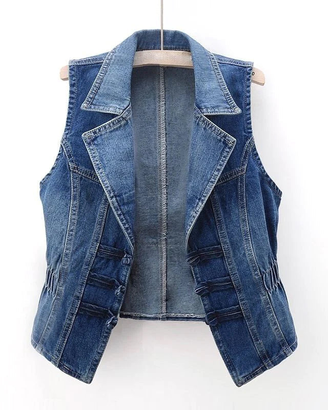 Celestial medium blue washed denim vest with toggle fastenings from Lumina Wear, featuring a stylish sleeveless design.