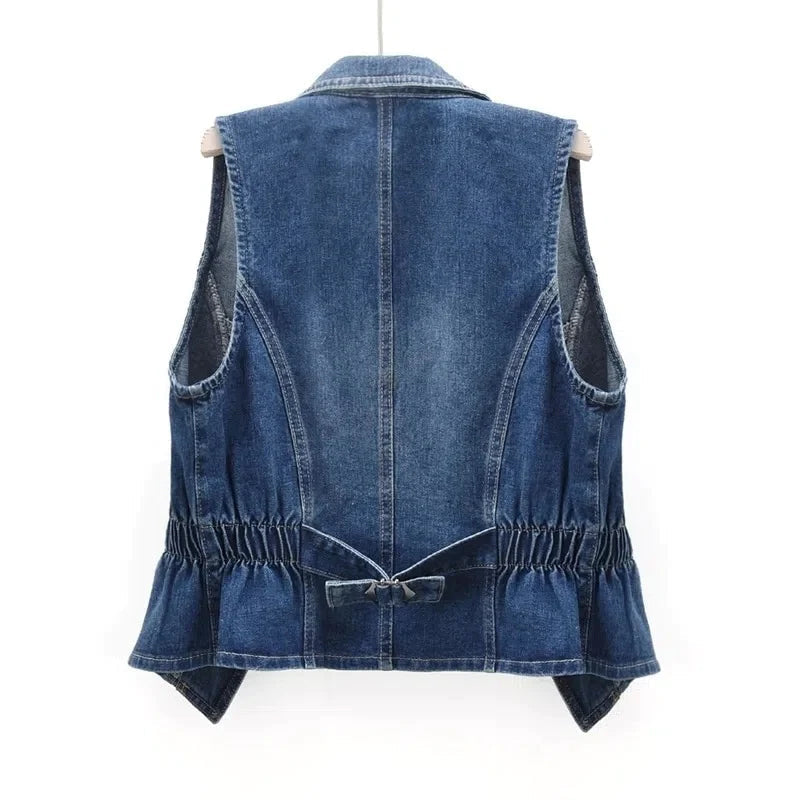 Celestial medium blue washed denim vest with toggle fastenings from Lumina Wear, casual sleeveless vest for women.