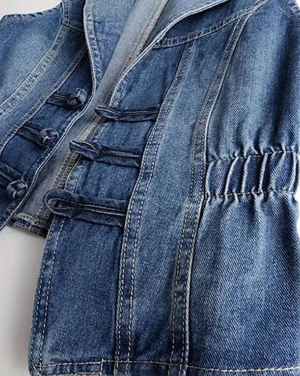 Celestial blue washed denim vest with toggle fastenings by Lumina Wear, featuring a medium fit and stylish design.