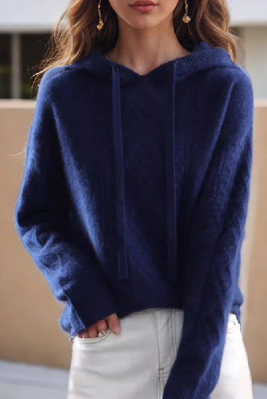 Lumina Wear Valentina cozy cable-knit hooded sweater with a relaxed fit, featuring a soft knit texture and a casual, comfortable design.