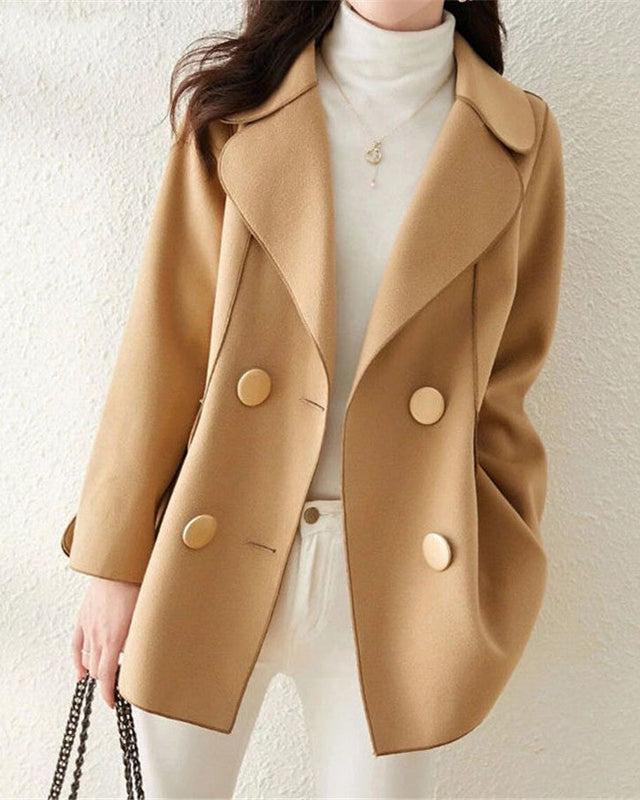 Valentina Lumina Wear elegant khaki wool coat with structured lapels, showcasing a sophisticated and tailored design.
