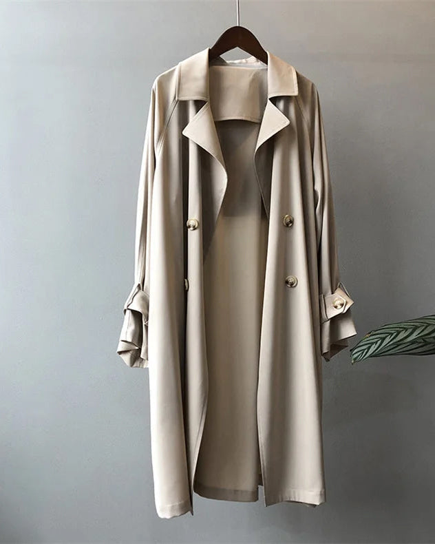 Elegant black lightweight trench coat with silky drape from Lumina Wear, featuring a sleek design and stylish silhouette.