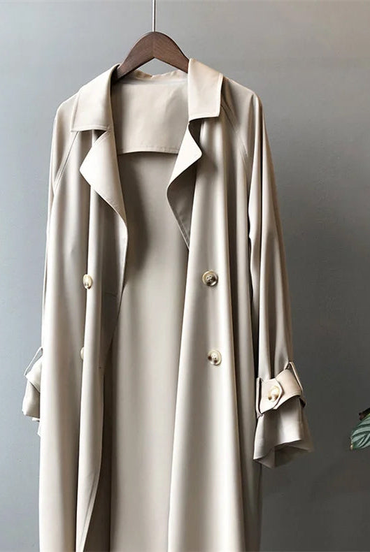 Elegant black trench coat for women with silky drape from Lumina Wear, lightweight and stylish for sophisticated outerwear.