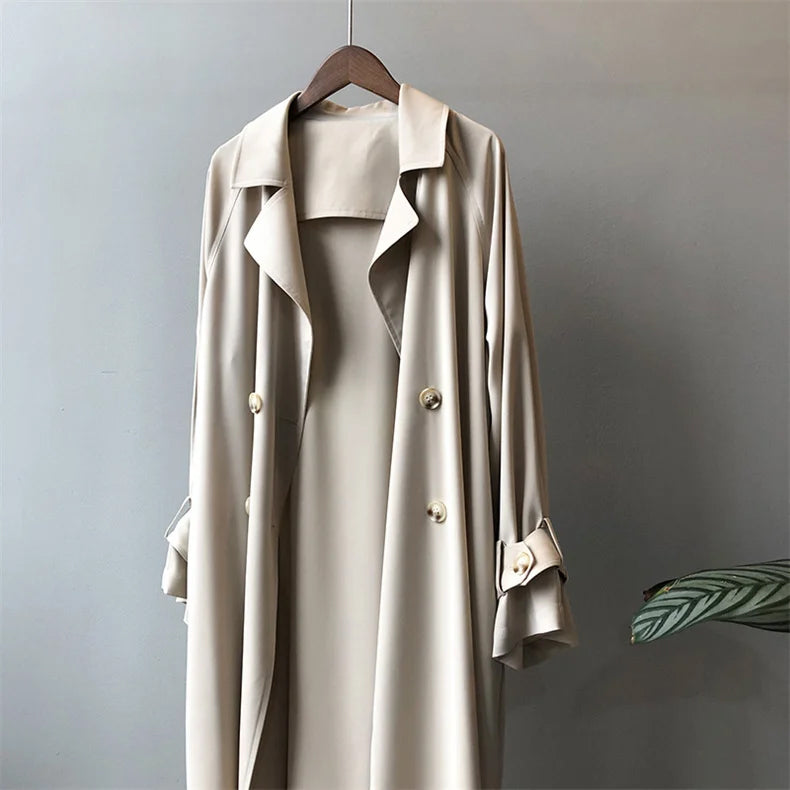 Elegant black trench coat for women with silky drape from Lumina Wear, lightweight and stylish for sophisticated outerwear.