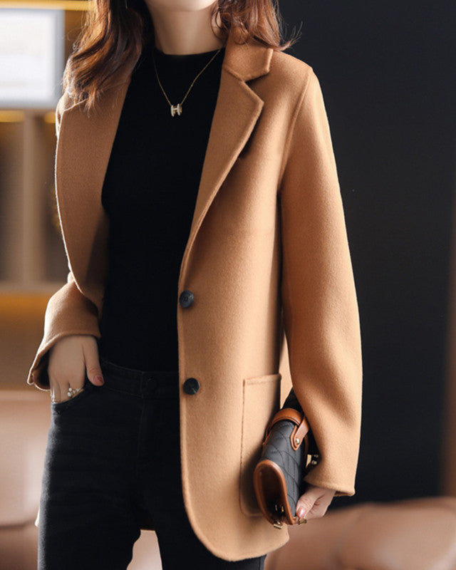 Valentina Lumina Wool Coat with relaxed fit and lapel collar, stylish and warm outerwear for women.