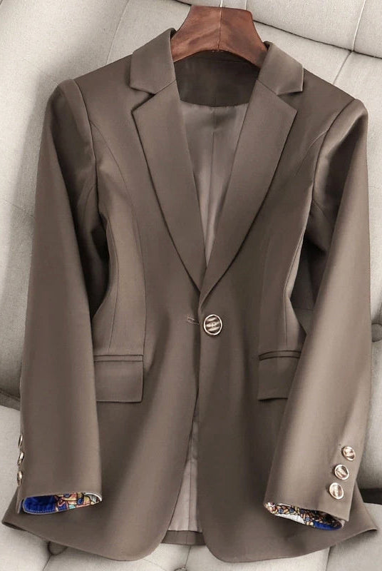 Lumina Wear Valentina lightweight sleek one-button blazer with classic fit, shown on a mannequin in a professional setting.