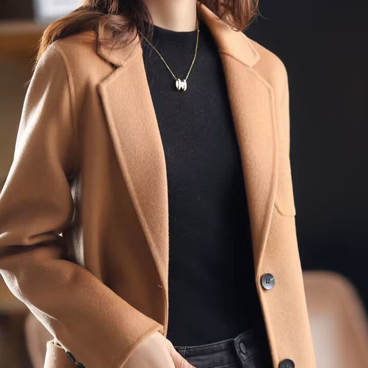 Valentina Lumina relaxed fit wool blend winter overcoat with lapel collar, shown in dark gray on a model.